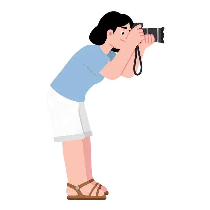 Person taking photo with camera representing carefully curated home decor ideas and intentional styling inspiration