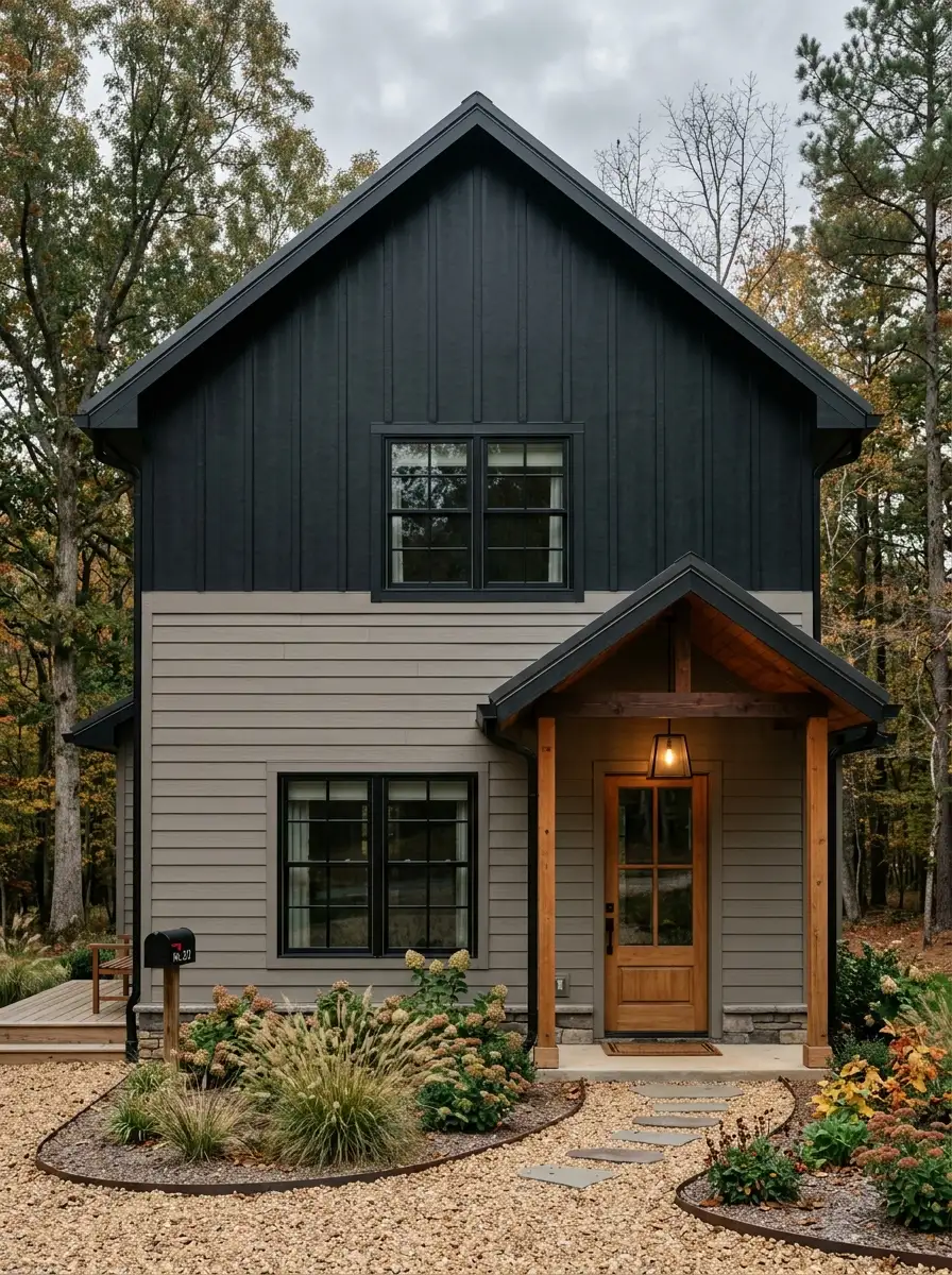 19 Stunning Small Barndominium Exterior Ideas That Prove Simple Barn House Designs Can Make a Big Impact 6 Small barndominium exterior with horizontal gray lap siding below and vertical black board-and-batten above, mixing textures for modern rustic appeal